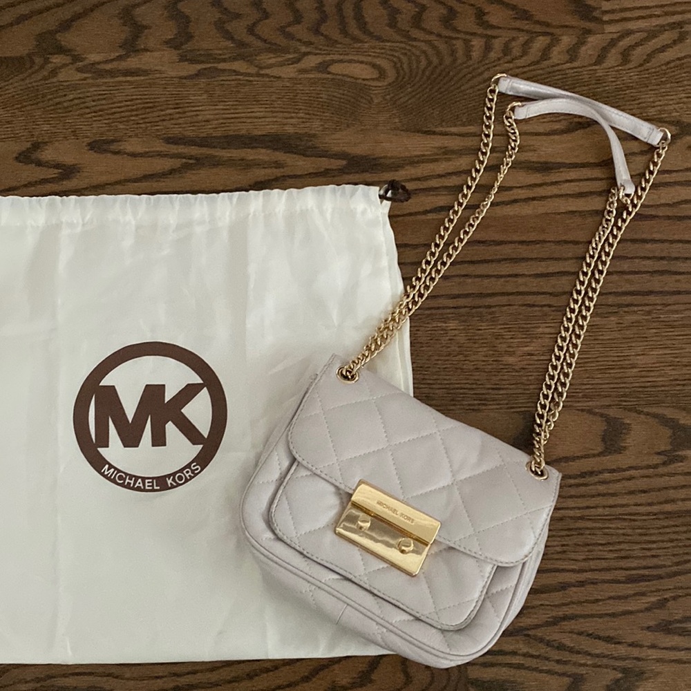 Michael Kors White Leather Quilted Handbag with Gold Hardware with duster bag